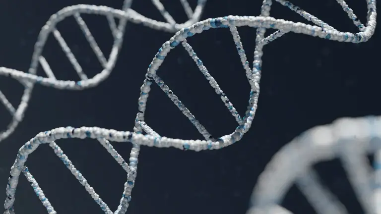 A blue DNA double helix on a dark background
