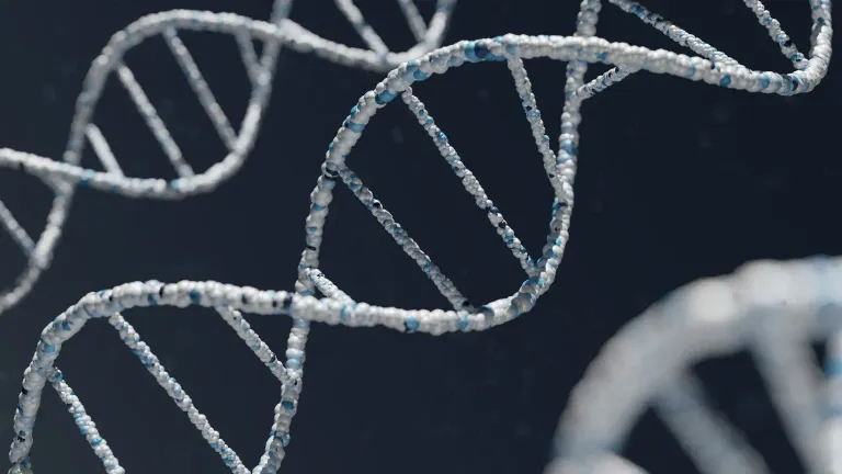 A blue DNA double helix on a dark background