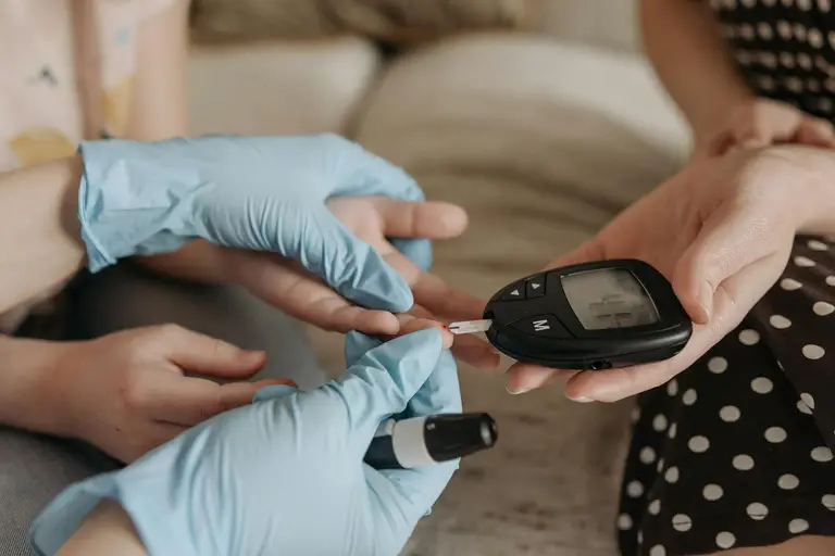 Glucose meter and insulin testing equipment representing fasting insulin laboratory measurement