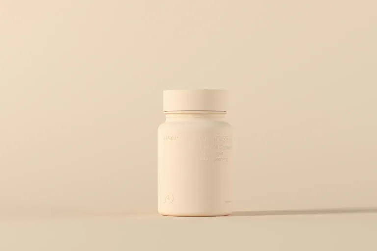 A plain supplement bottle on a warm beige background