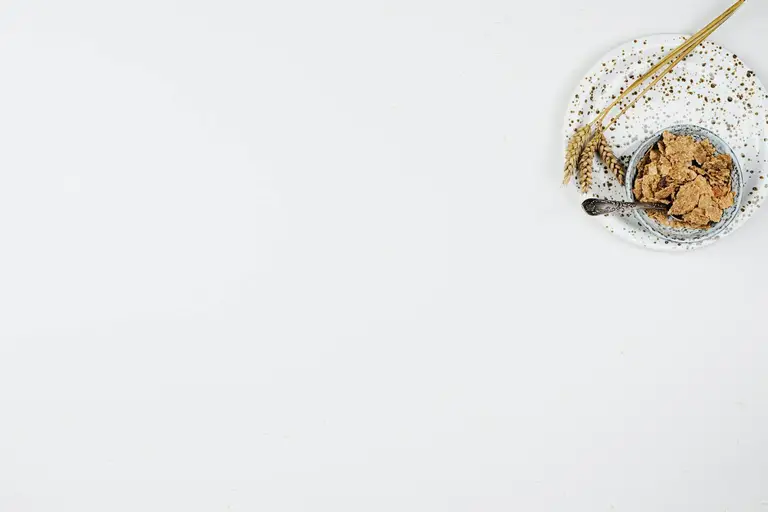 Bowl of whole wheat cereal representing dietary sources of spermidine