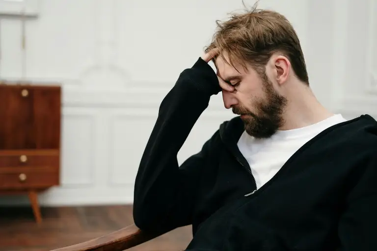 Man reviewing testosterone supplement research