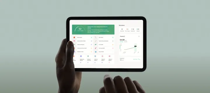 The Mito dashboard on a tablet, showing biomarker results and trends