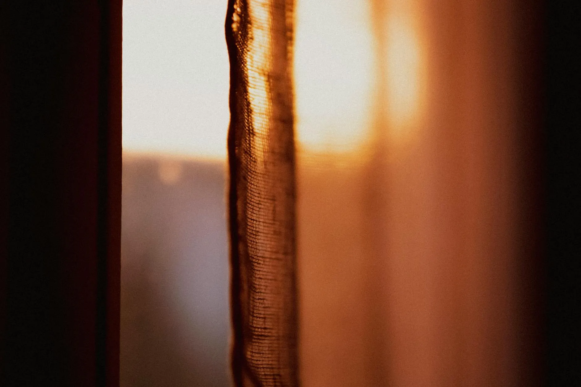 Sunlight reaching through a window onto a kitchen counter